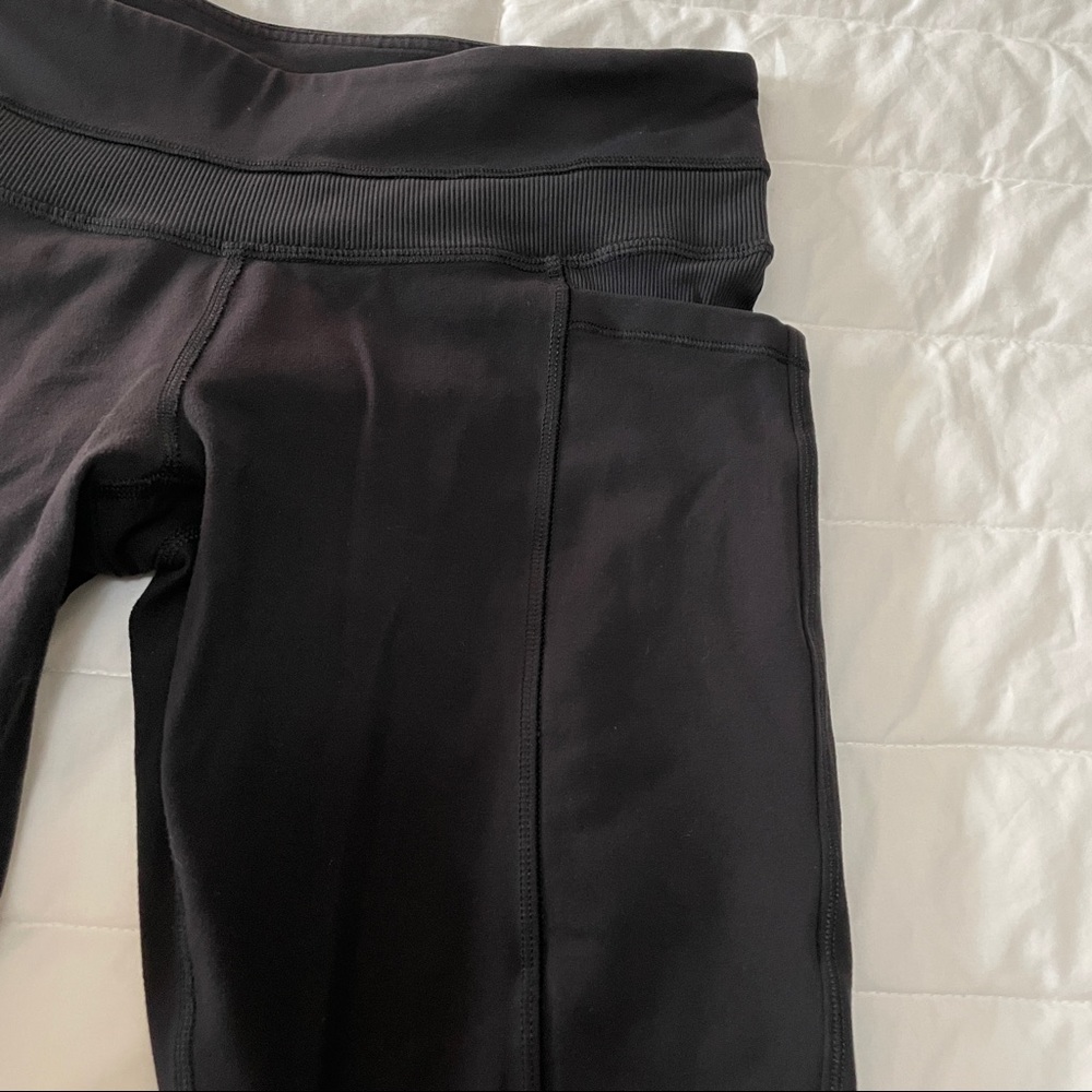Lululemon size 8 black jogger style exercise legging with side pockets
